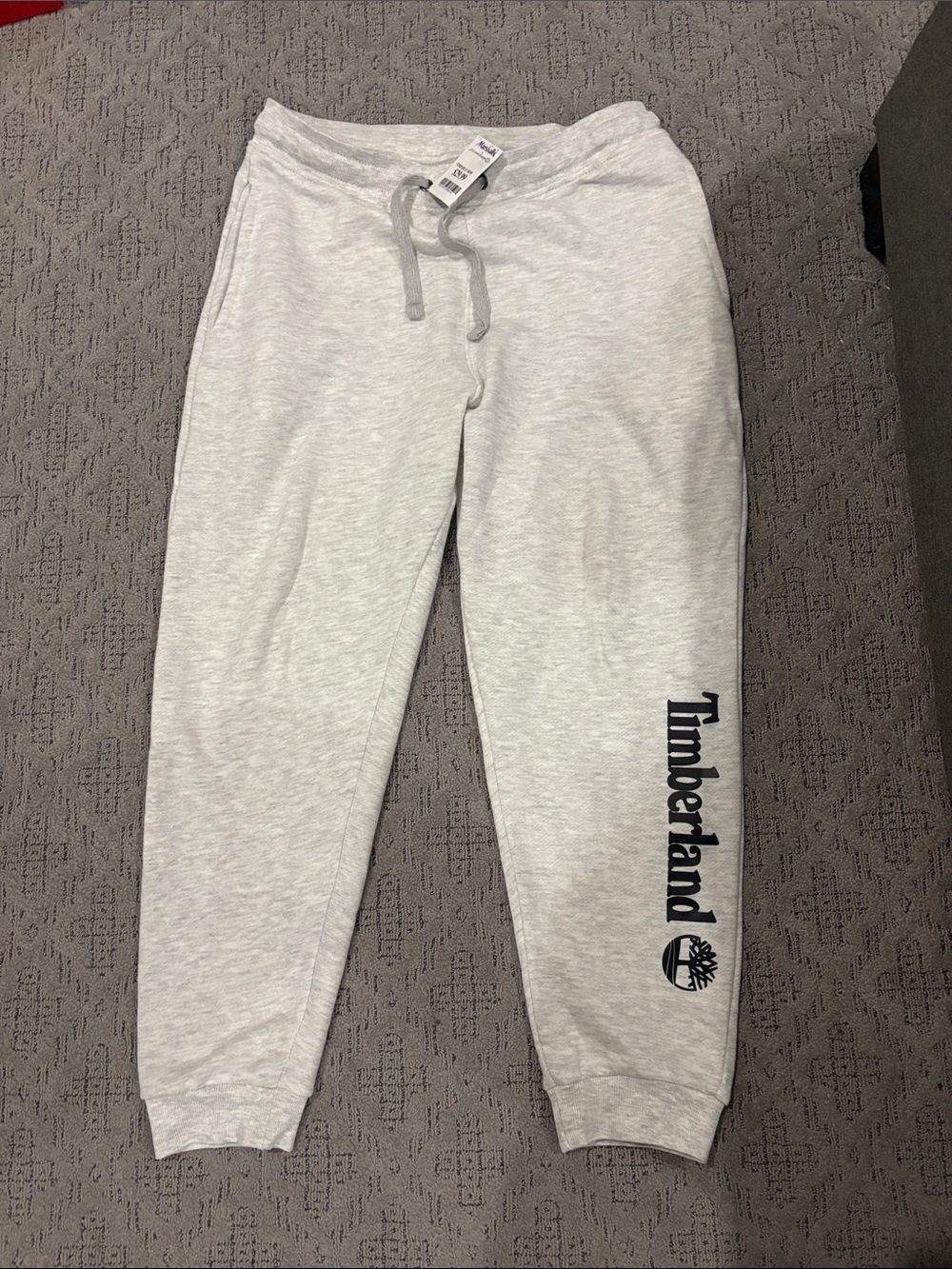 Timberland men’s  Light Gray Sweat Joggers with Black Logo